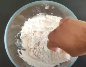 Dip each chicken breast into the flour mixture for