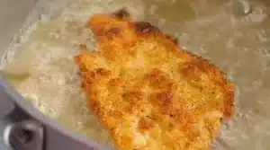 Cook the chicken through and to golden brown color by frying it for 5 to 7 minutes on each side for Texas Roadhouse Country Fried Chicken Recipe.