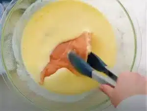 Place the chicken pieces in the buttermilk bath, making sure they are well submerged. Allow them to marinade for at least 30 minutes, or overnight in the refrigerator for even greater results for Texas Roadhouse Country Fried Chicken Recipe.