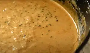 Add one cup of heavy cream and one to two tablespoons of crushed peppercorns for Texas Roadhouse Pork Chop Peppercorn Sauce Recipe.