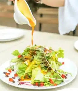 Serve your favorite salads, wraps, or sandwiches with a sprinkle of Texas Roadhouse French Dressing Recipe.