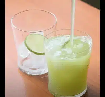 garnish each glass with a sprig of fresh mint and a slice of cucumber.