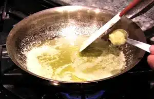 Add 5 tablespoons of olive oil in a small pan over low heat, and add melt the butter then stir in the mash garlic for Texas Roadhouse Crouton Recipe